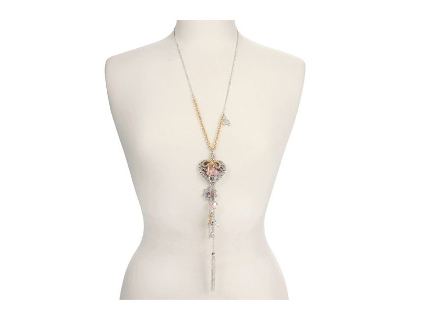 Add breezy style with GUESSs wild romance heart long necklace in 2 