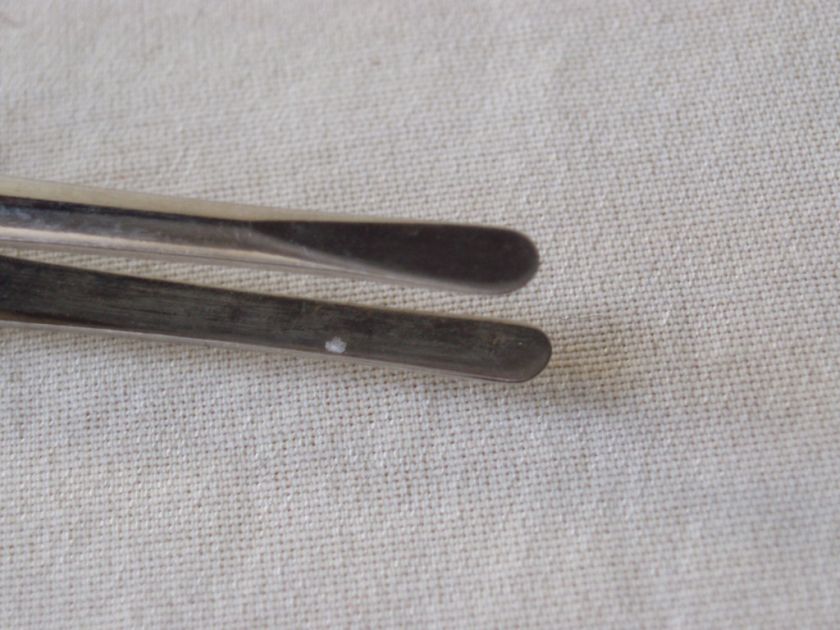 These are rare Kiehl postal stamp tweezers, made in Germany. They 