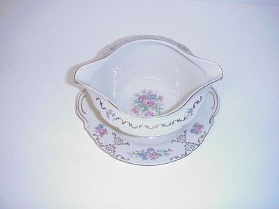 and purple floral sprigs this gravy boat measures 7 2 8 long by 6 5 8 