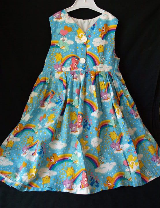 terrific little care bears dress is handmade buttons up the front has 