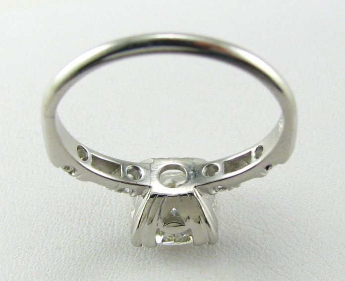 This ring weighs in at 5.2 grams . The face measures 5/16 (8mm 