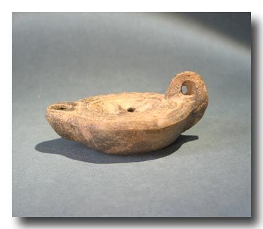 Roman Signed Oil Lamp with Cupid, 1st 2nd Century A.D.  