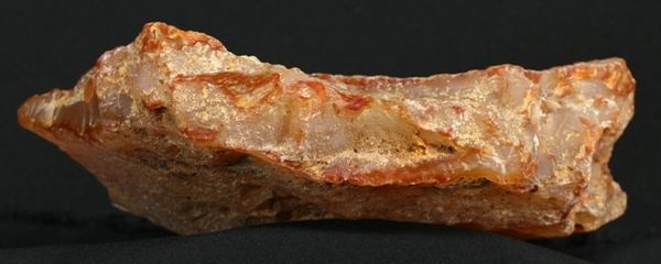   naturally occurring iron compounds within the agate itself over eons