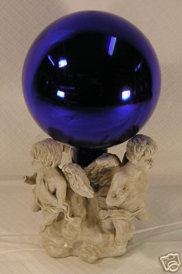 Angel gazing globe holder, by Michael Gordon  